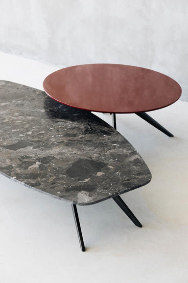 black marble table low, next to coffee table