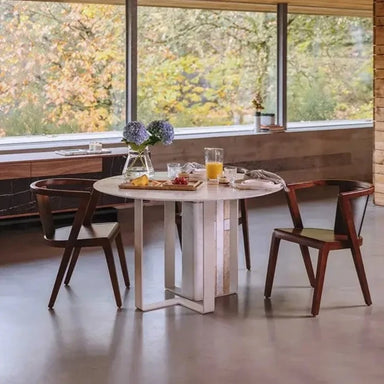 eco nibble marble dining table with chairs and food